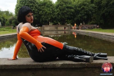 Public Posing In Orange-black Latex Outfit 11